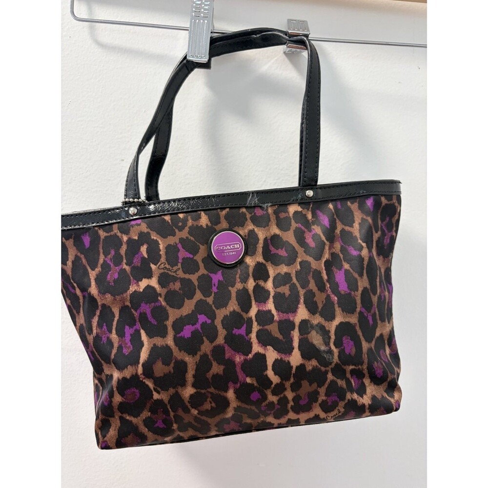 Black & Purple.  Mini tote. No long straps. This is too small for me.